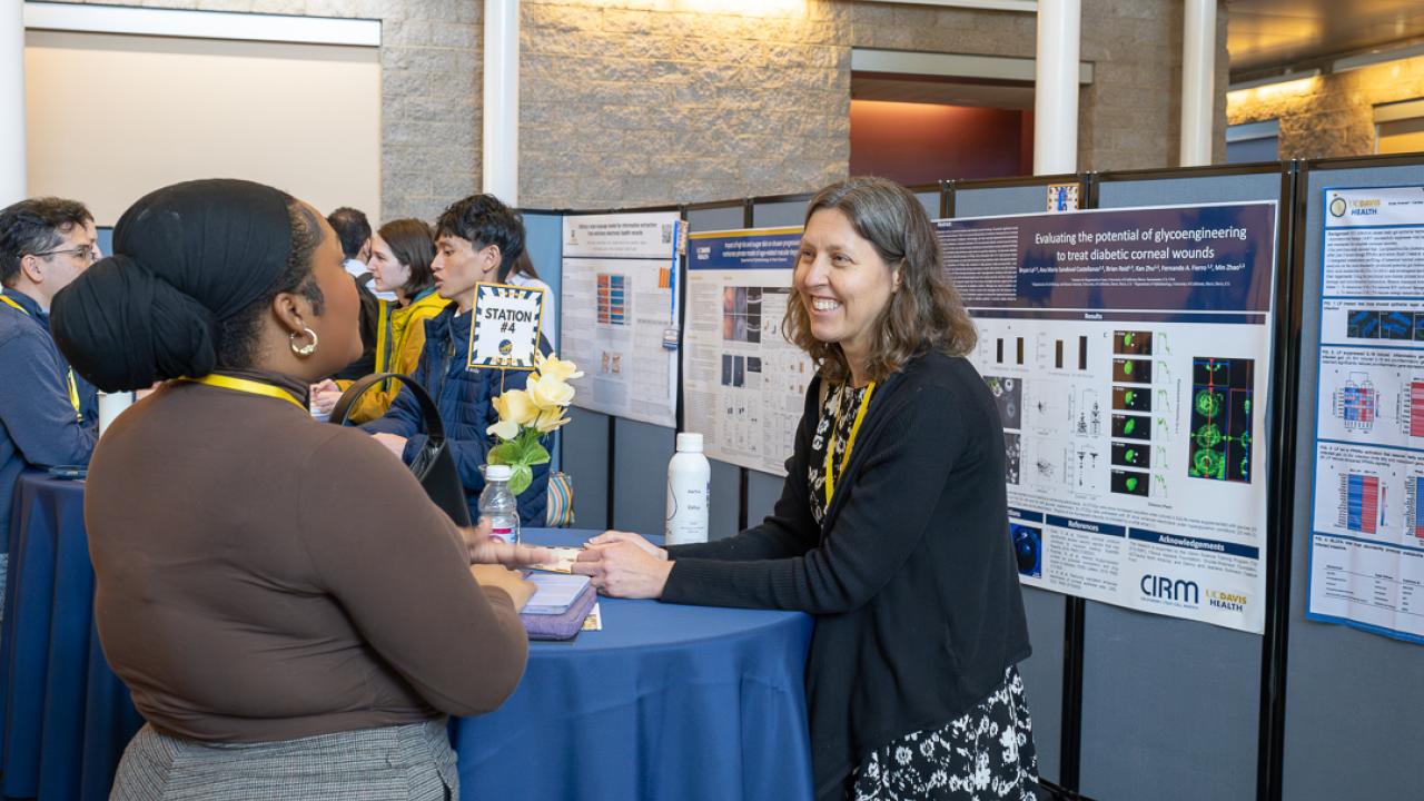Picture of GGIP Co-Chair, Dr. Sara Thomasy, meeting with prospective students