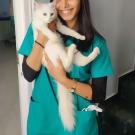Picture of Gatha Pore holding a cat